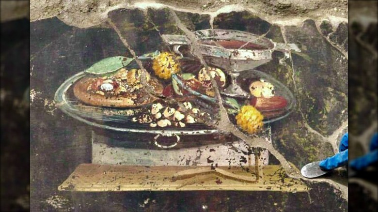 Mural de comida en Pompeya, incluyendo pizza