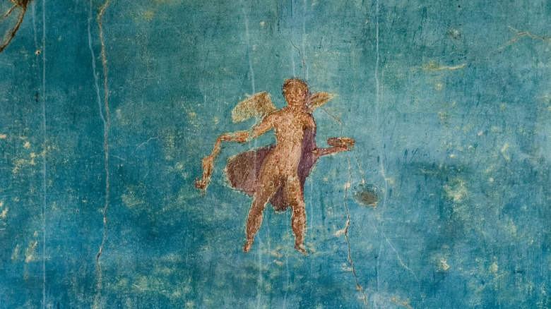 Detalle en la figura del muro azul en Pompeya