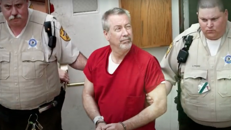 Drew Peterson con oficiales