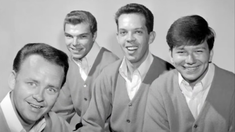 Bob Kuban y The In-Men sonriendo en una foto de promoción