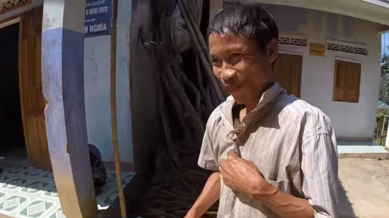 Ho Van Lang sonriendo